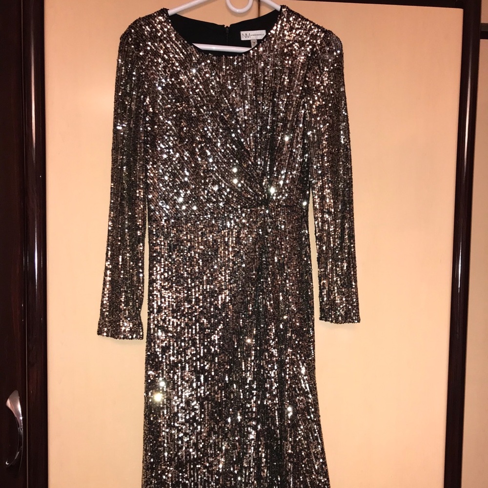 Warn once Neiman Marcus size 8 dress with a slit